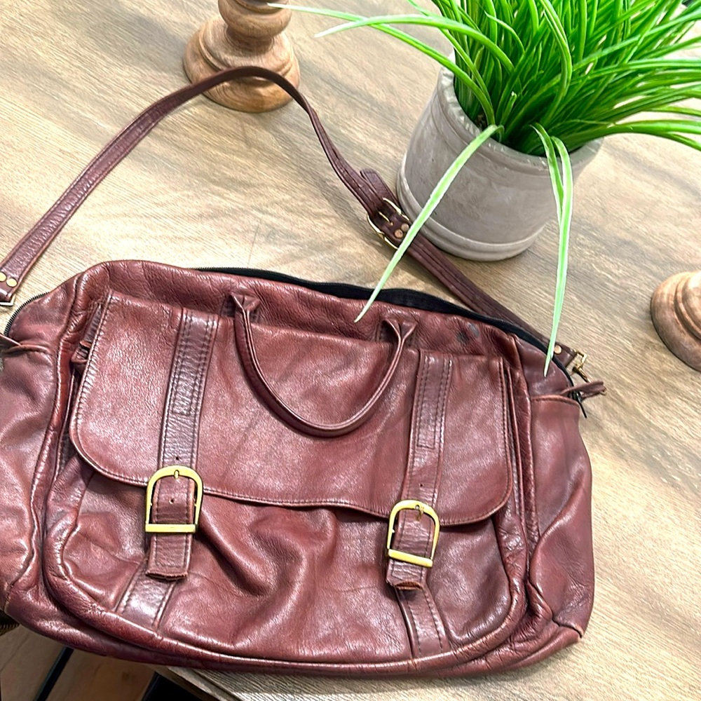 Cowhide genuine leather satchel briefcase or work bag.